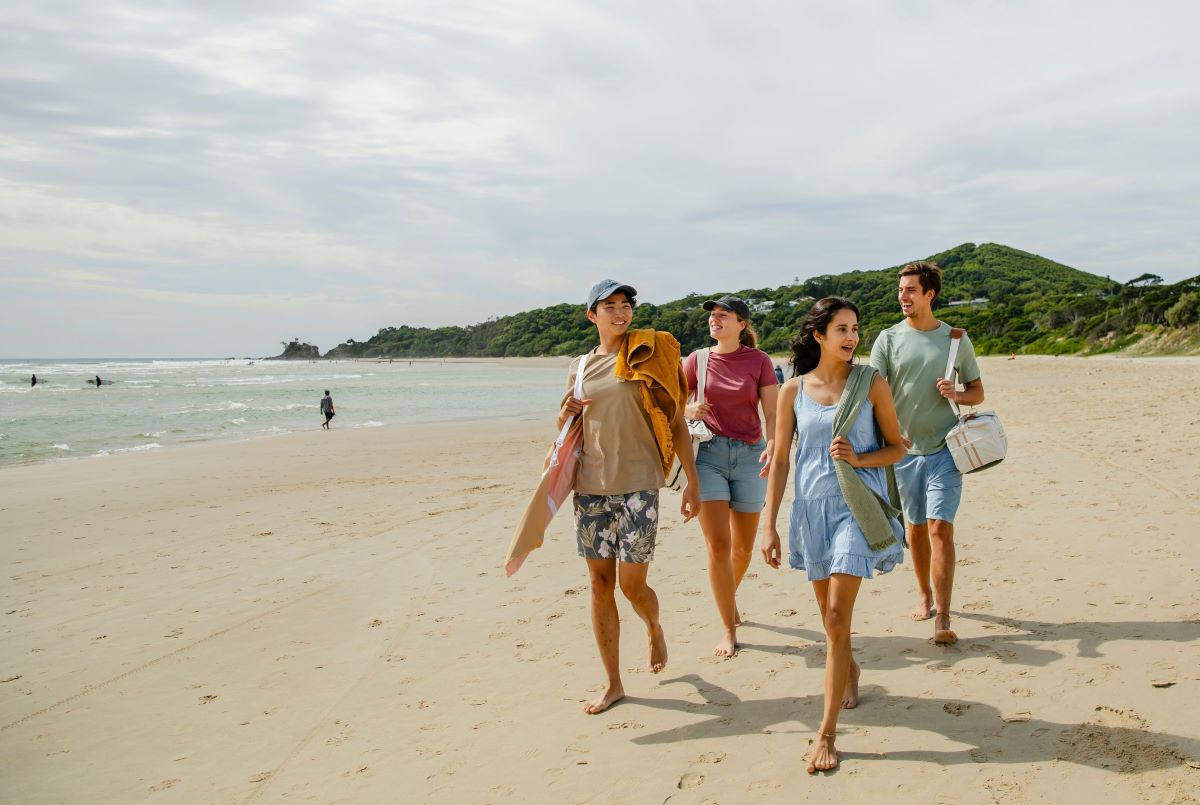 Young people enjoying a day out at Clarkes Beach, Byron Bay