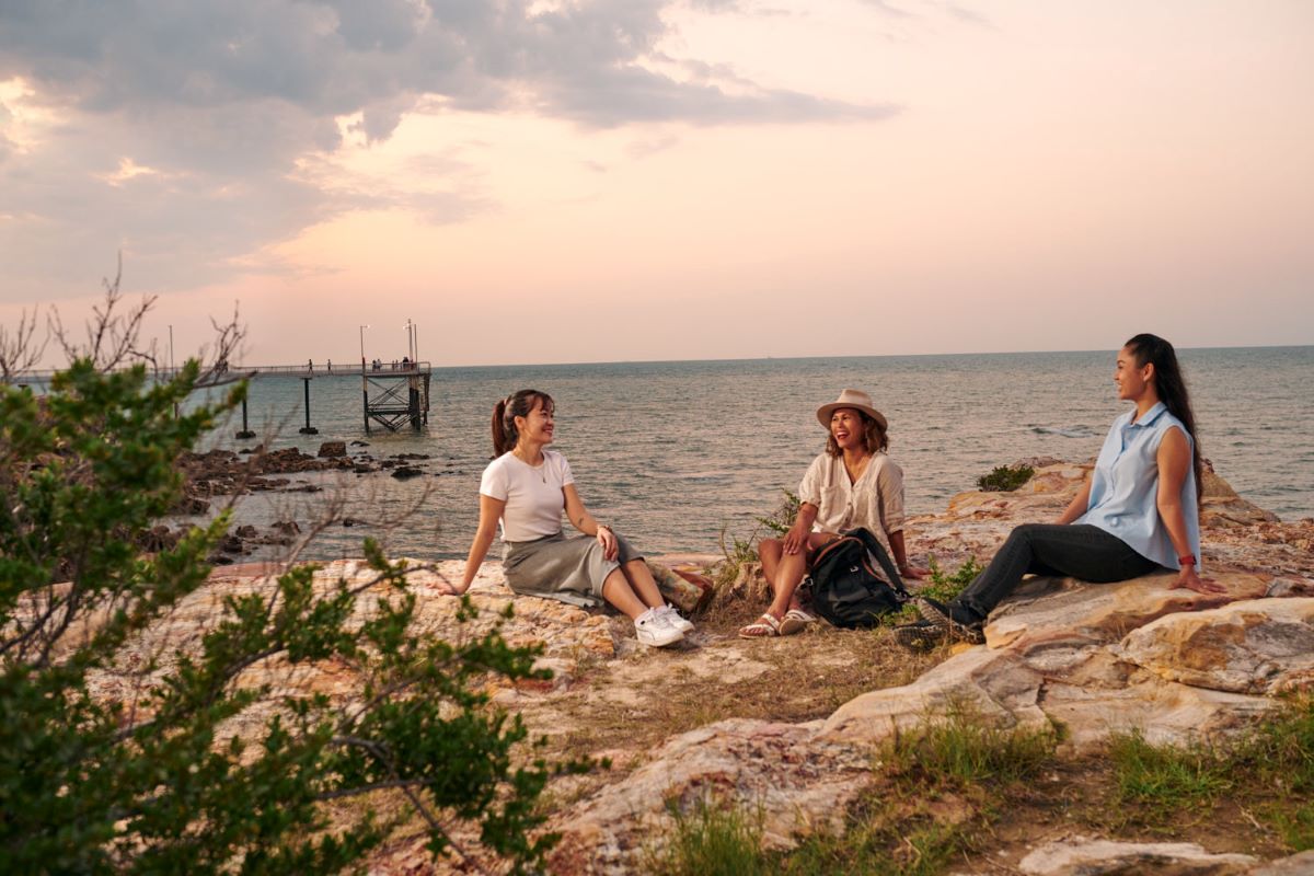 International students enjoying the sunset on the Nighcliff rocks in Darwin